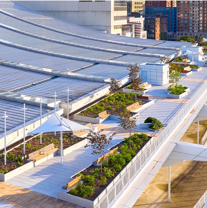 Overburden solutions: rooftop amenity space with landscaping and city view