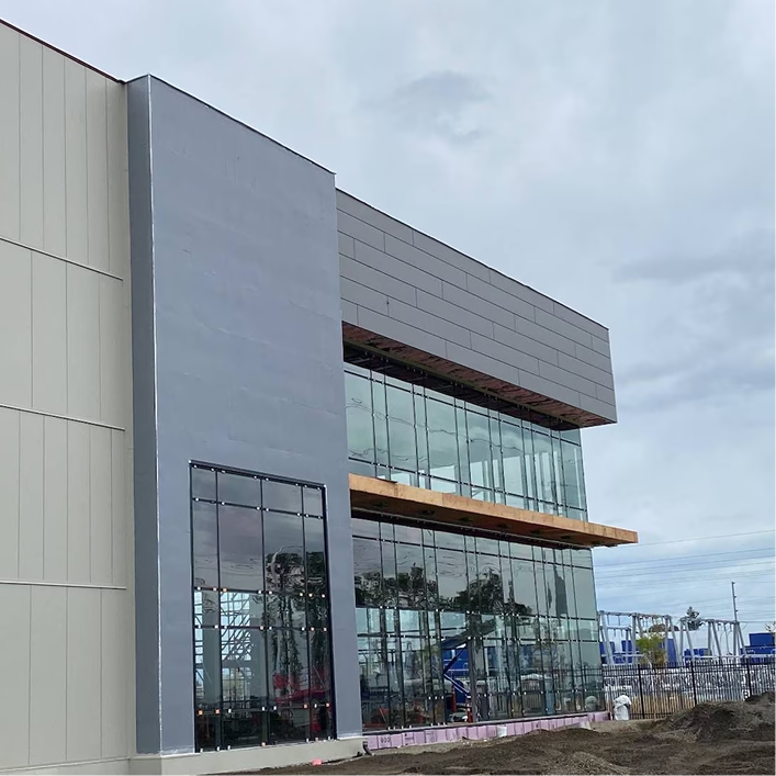 Commercial building constructed with air and water barriers (AWBs)