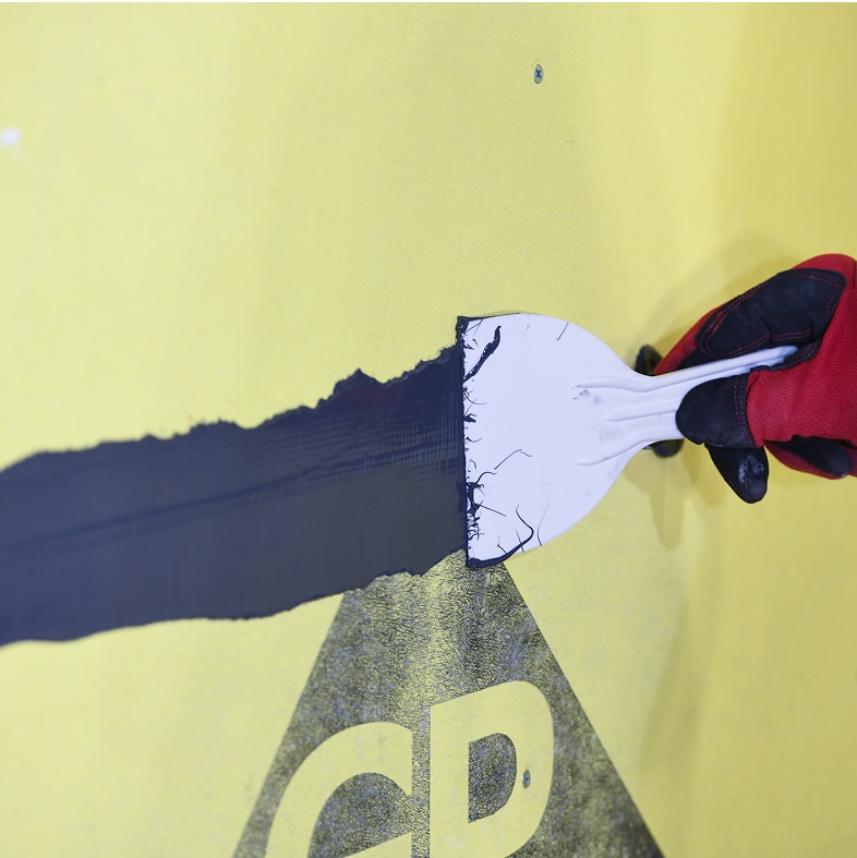 WALLcontrol™ modified silicone STPE VP liquid flashing application on a commercial wall system.