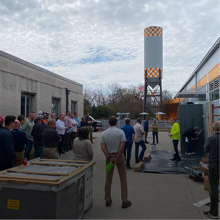Outdoor hands-on roofing product demonstration facility for contractors and architects earning accredited CEU credits.