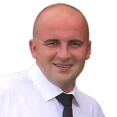 Headshot of Kenny Korkut, Regional Manager