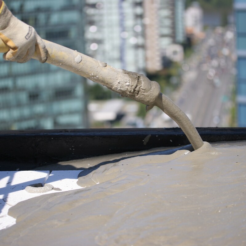 Lightweight concrete top coat being poured