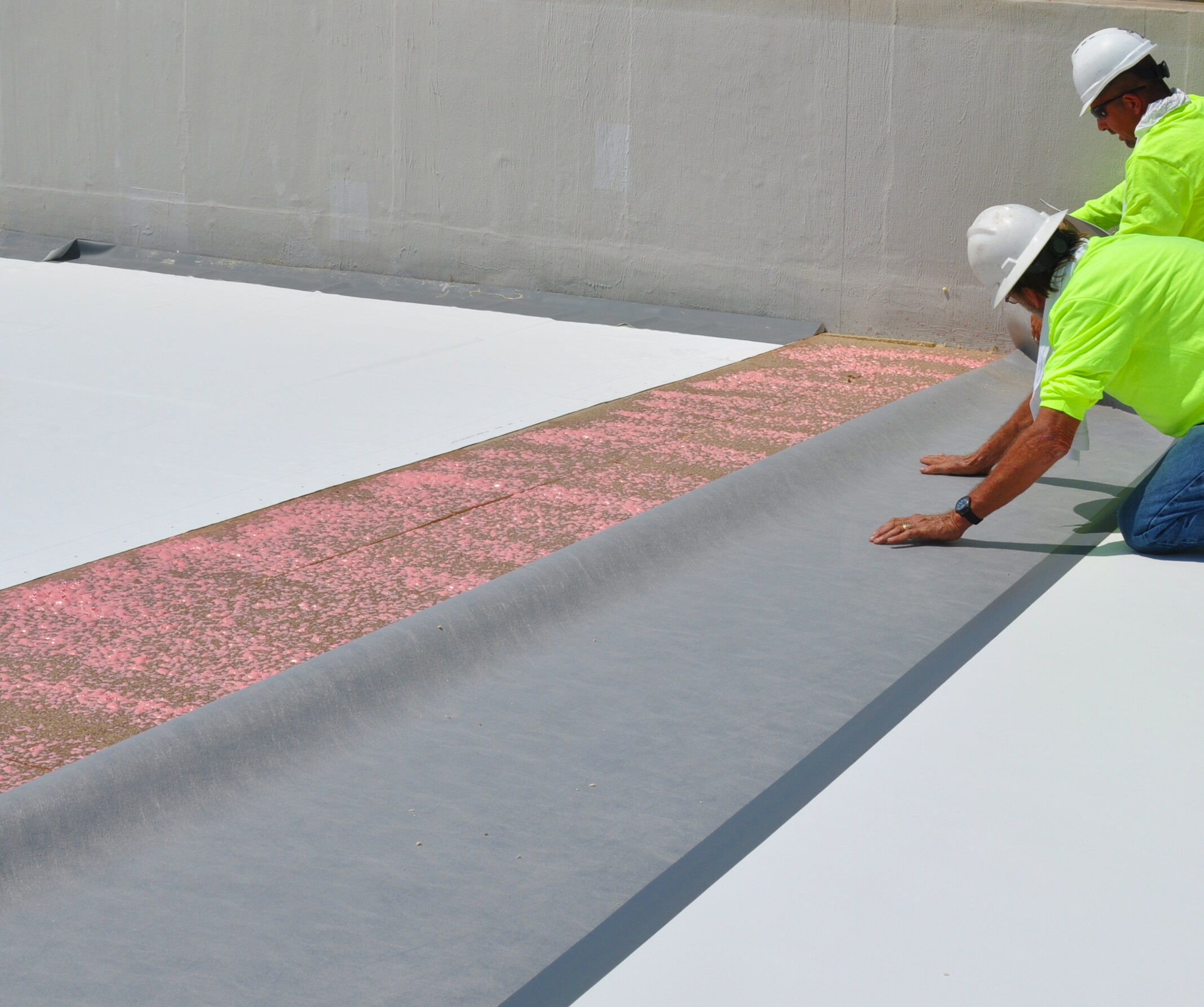 Certified Siplast contractor installing a mission critical roofing membrane on a data center.