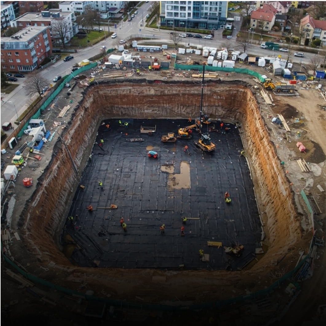 Construction site for new building using pre-applied waterproofing membrane material from Siplast.