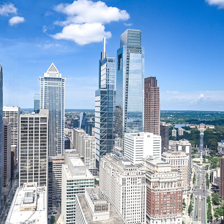 A view of a skyline with commercial building structures, which are prime projects for Siplast's services.