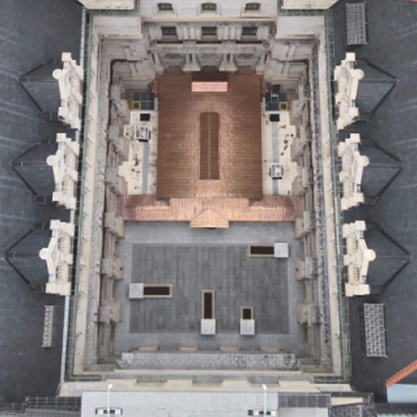 Overhead view of the New York State Capitol's intricate roof structure and central courtyards.