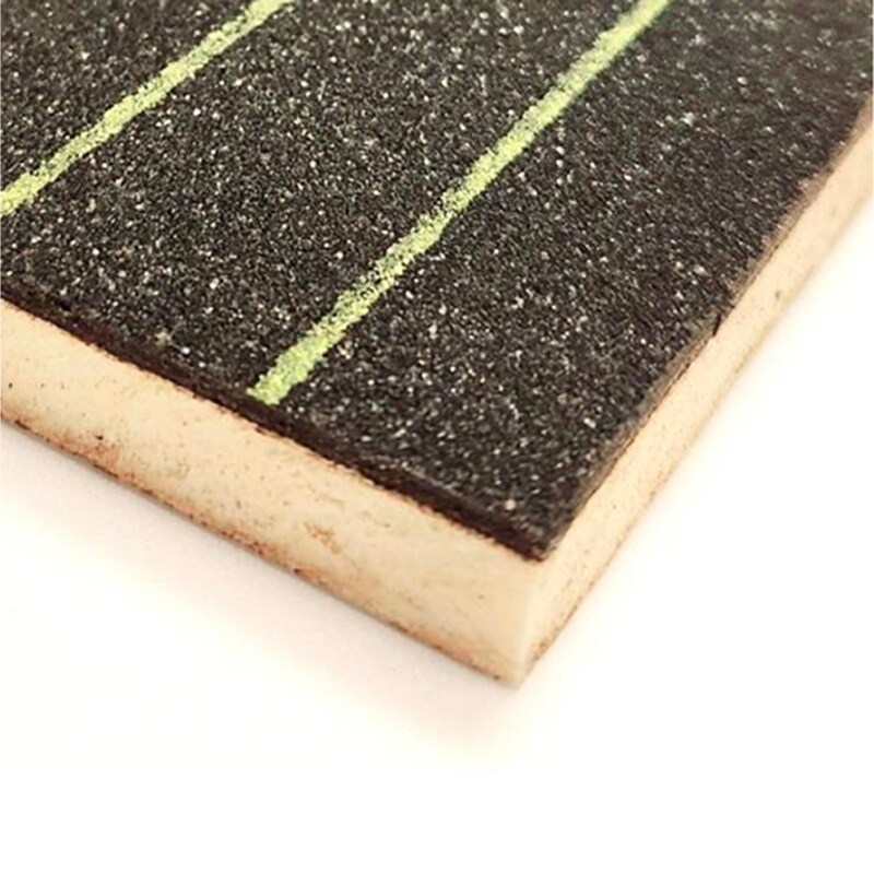 Close-up of a dark roofing board with green lines, showcasing the texture and composition of Parababord HD insulation.