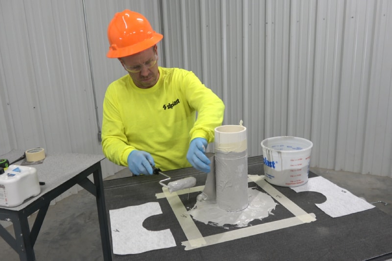 Contractor installing Parapro Flashing Resin by Siplast