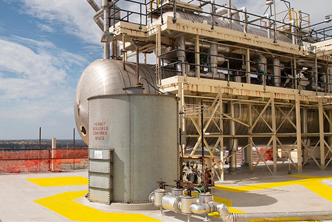 Industrial tank containing Siplast Parapro Roof Membrane Resin for PMMA systems.
