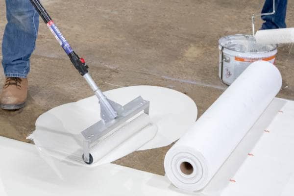 Contractors installing Terapro Base Resin by Siplast