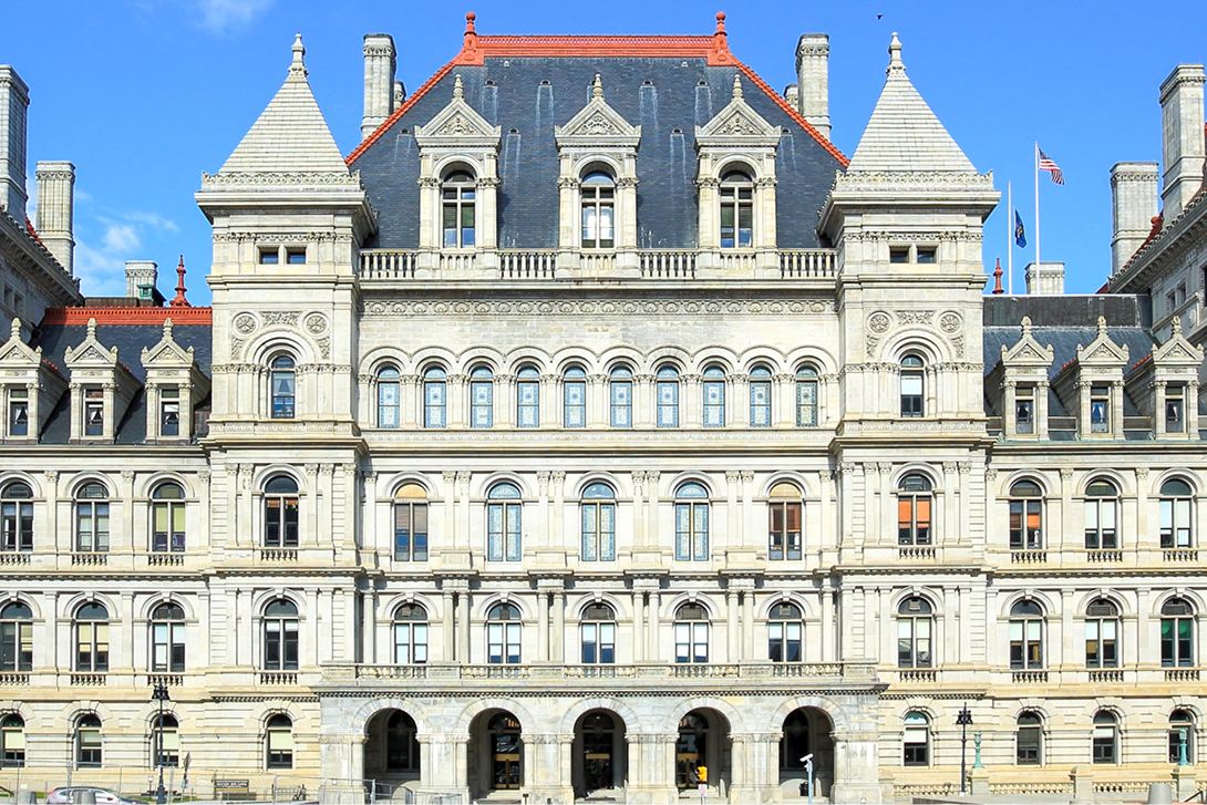 Historic building preservation and restoration featuring roofing and waterproofing enclosure solutions
