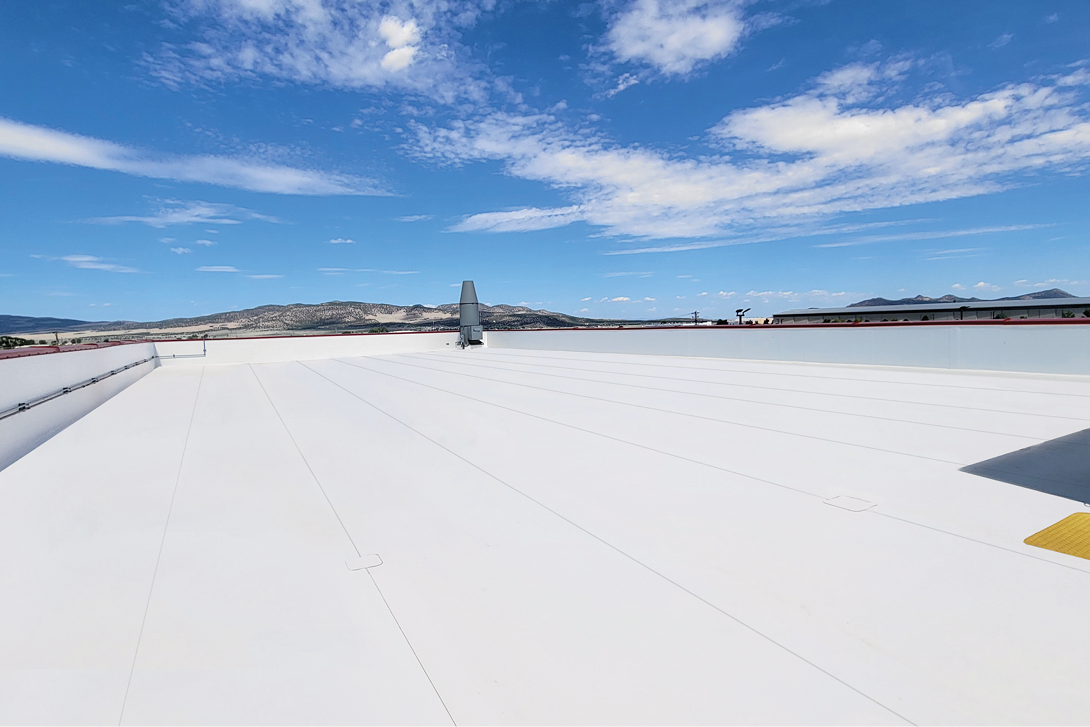 Sustainable reflective roofing for data centers that contributes to green building rating goals.