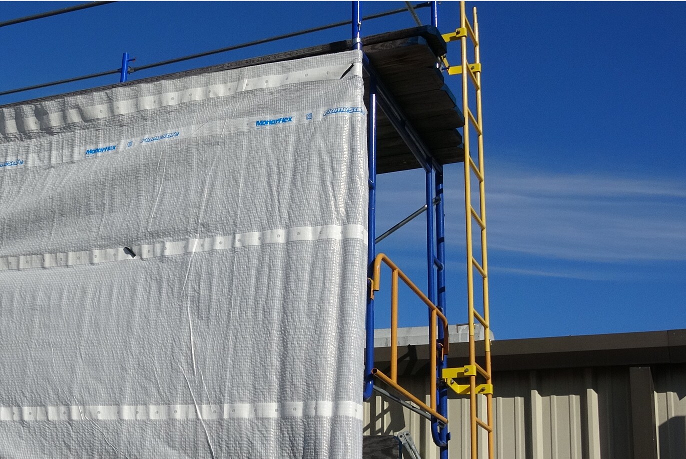 Monarflex Super T Plus Flamesafe membrane covering an exterior wall during construction.
