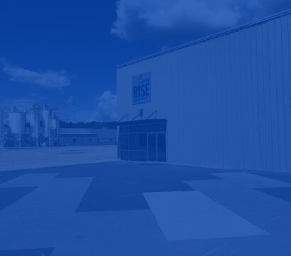 Exterior of the Siplast RISE Center building and manufacturing plant on a sunny day, showcasing the commitment to innovation.