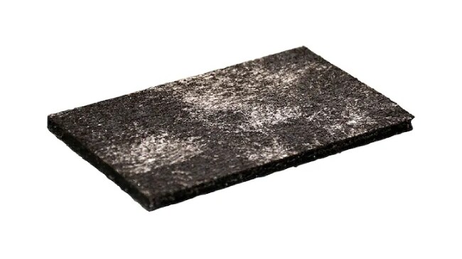 Top and bottom view of two rectangular Sturdy-Dek® Asphaltic Cover Boards showing the dark asphalt-saturated fiberglass liners.