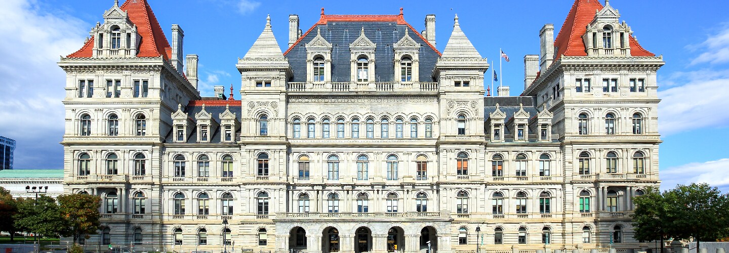 Historic building preservation and restoration featuring roofing and waterproofing enclosure solutions