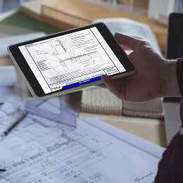 Architectural CAD detail drawing showing construction specifications on a tablet.