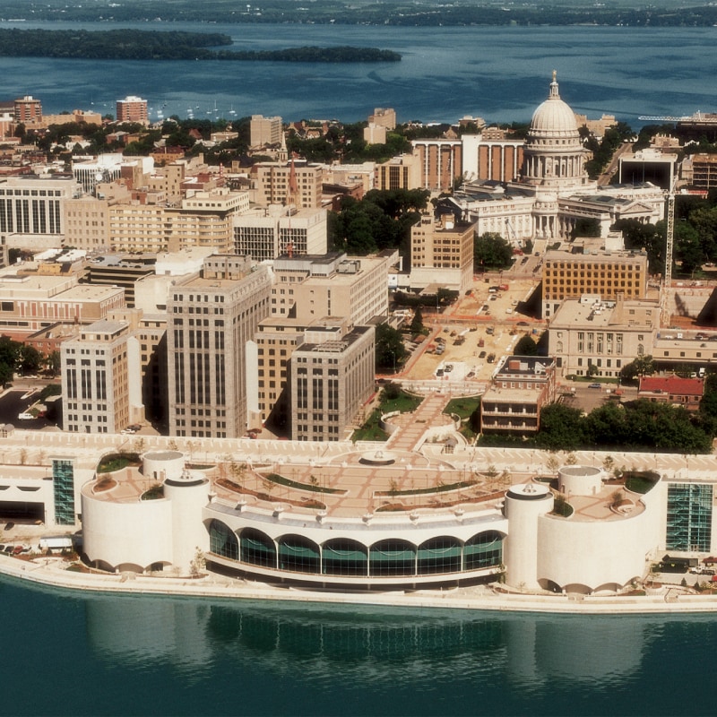 Architectural rendering or photograph of a multi-level terrace overlooking a city and waterfront