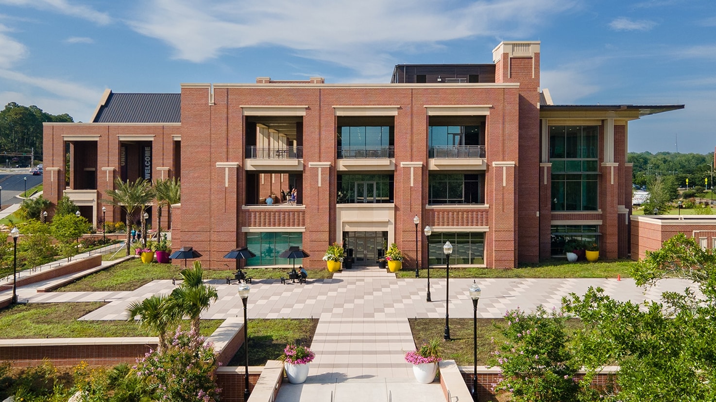 Exterior view of the Florida State University Student Union featuring brick architecture and modern plaza.