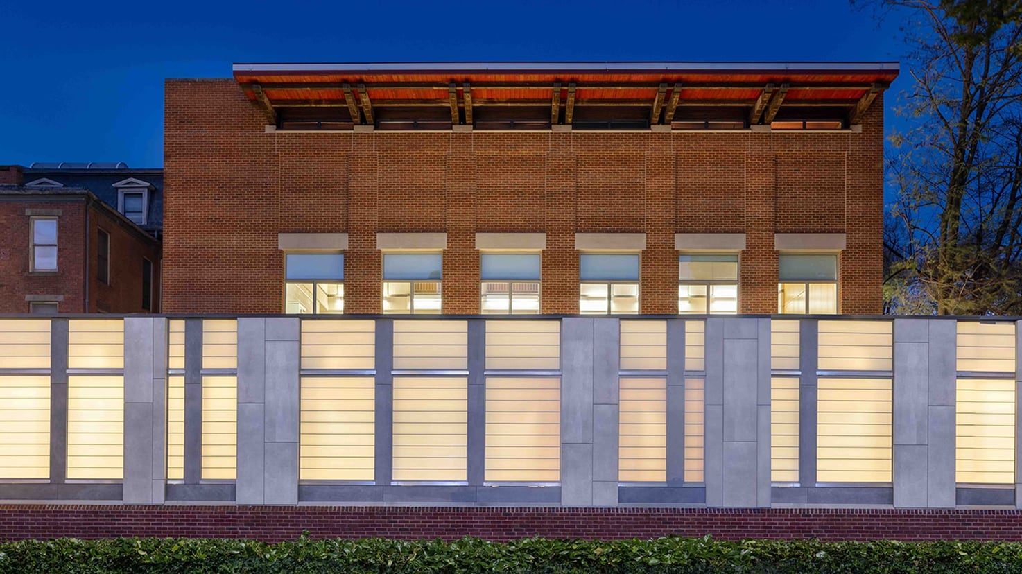 Exterior facade of the Joseph Slifka Center for Jewish Life at Yale at dusk, highlighting a renovation project profile.