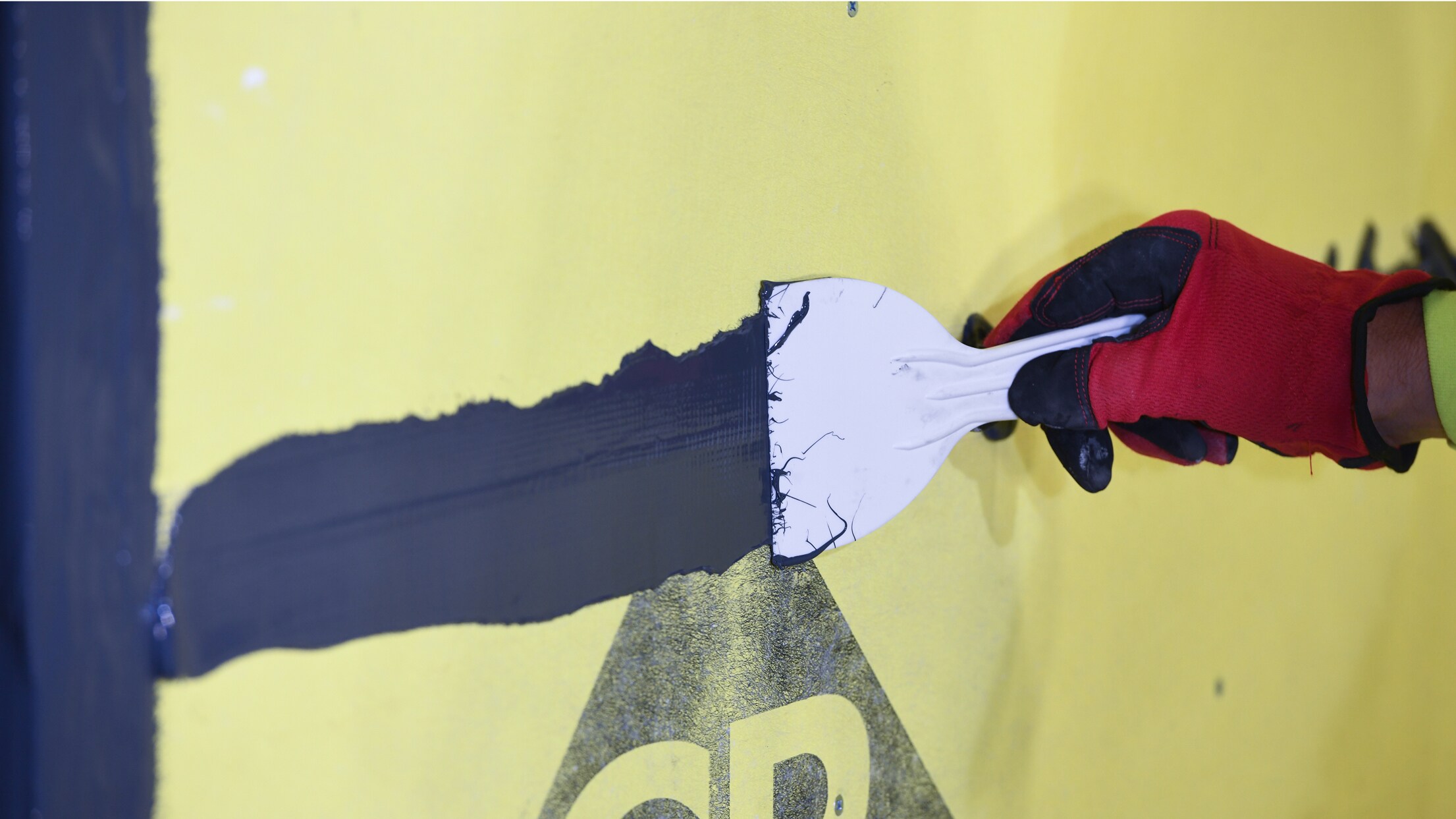 WALLcontrol™ modified silicone STPE VP liquid flashing application on a commercial wall system.