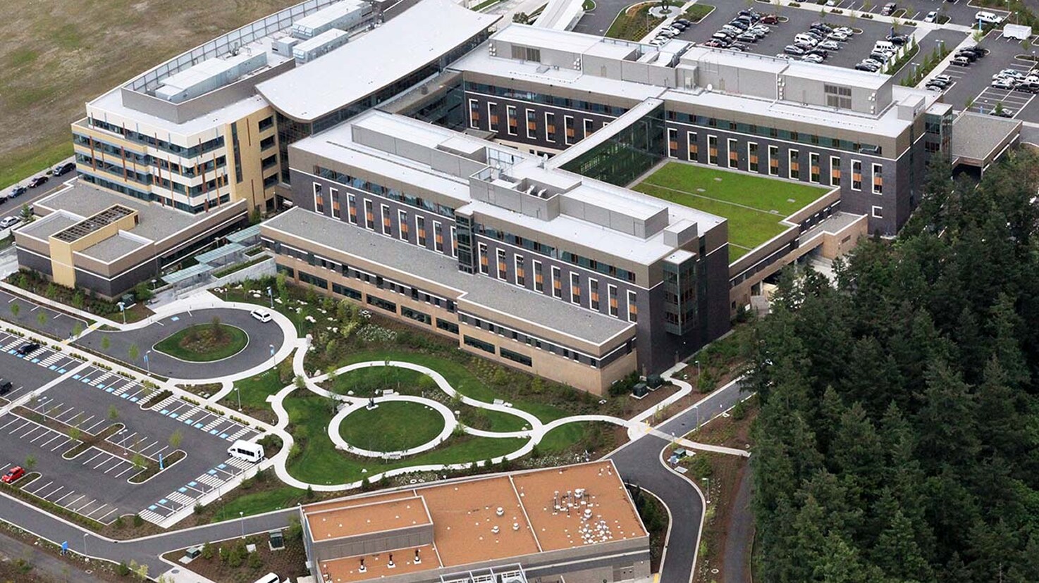High-angle aerial view of the Swedish Issaquah medical campus showing patient wings and green landscaping.